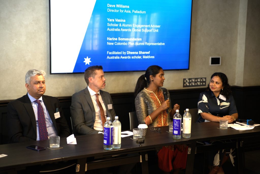 Aishath (right) facilitating a panel discussion at the 2025 Scholars Forum.
